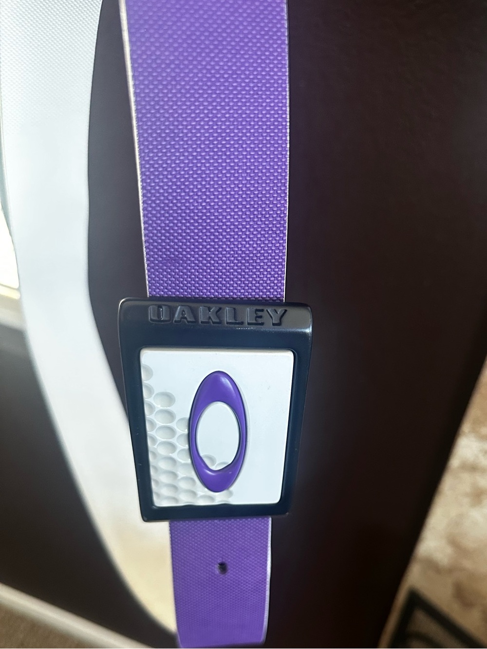 Oakley Belt Buckle with Purple Belt.